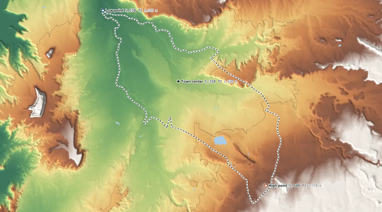 Topographic elevation map of Round Rock, Arizona, shaded from 5,230 ft on the northwest side to 5,800 ft on Big Mountain