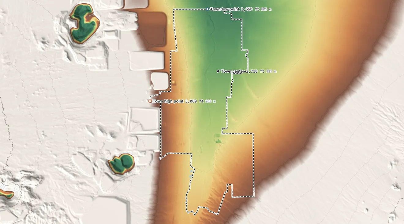 Topographic elevation map of Sahuarita, Arizona, shaded from 2,650 ft on the north side to 3,060 ft at the foot of the Sierrita Mountains
