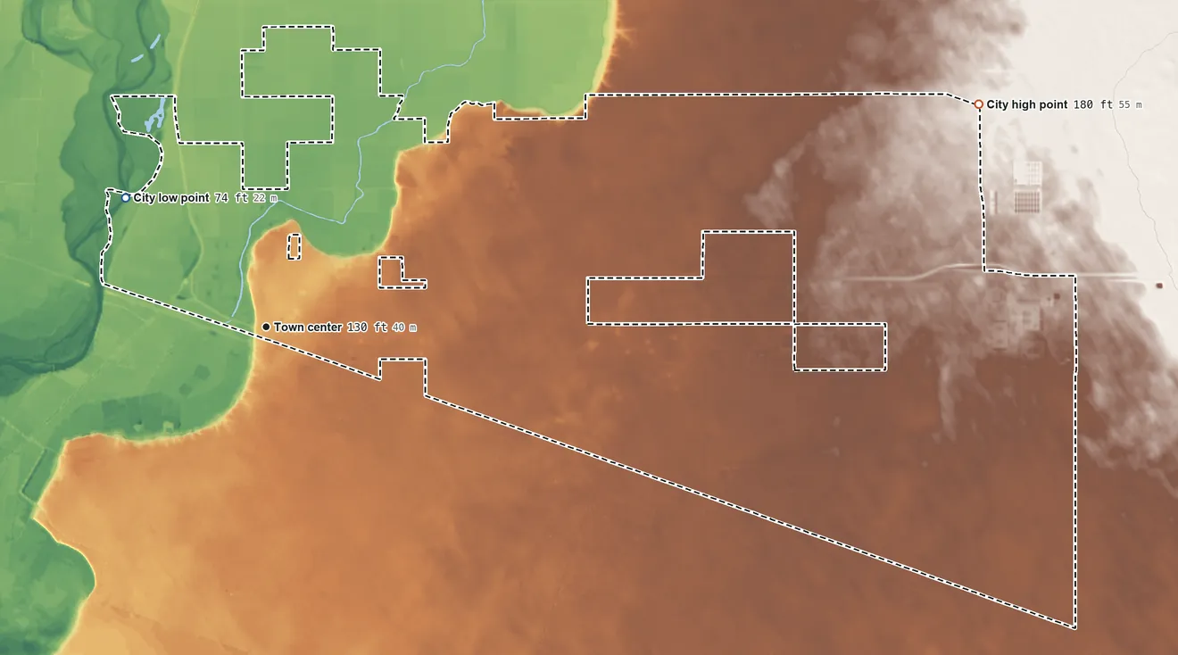 Topographic elevation map of San Luis, Arizona, shaded from 74 ft on the northwest side to 180 ft on the east side