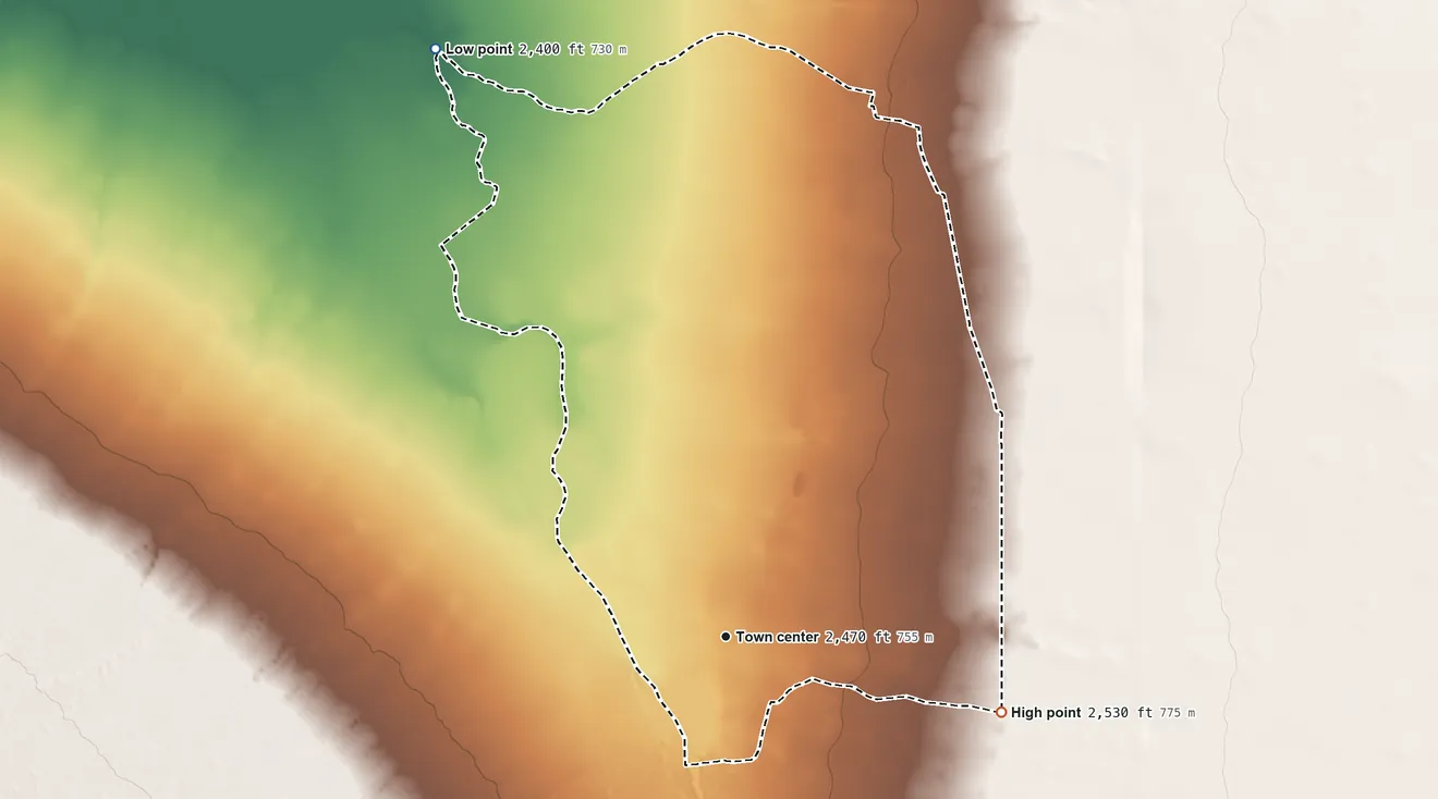 Topographic elevation map of San Miguel, Arizona, shaded from 2,400 ft on the northwest side to 2,530 ft on the east side