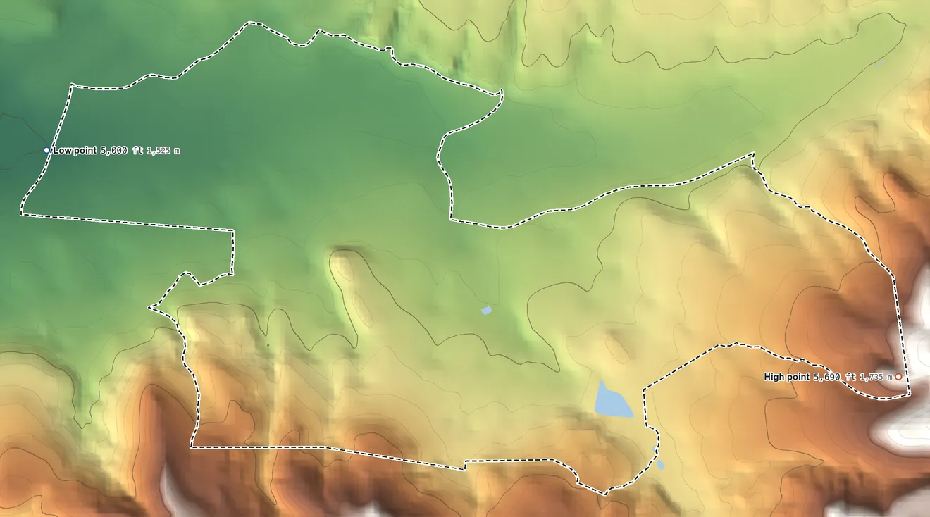 Topographic elevation map of Seven Mile, Arizona, shaded from 5,000 ft on the west side to 5,690 ft on the east edge, below higher ground just outside