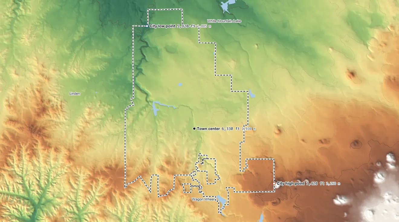 Topographic elevation map of Show Low, Arizona, shaded from 5,920 ft on the northwest side to 7,420 ft on the southeast edge, below higher ground just outside