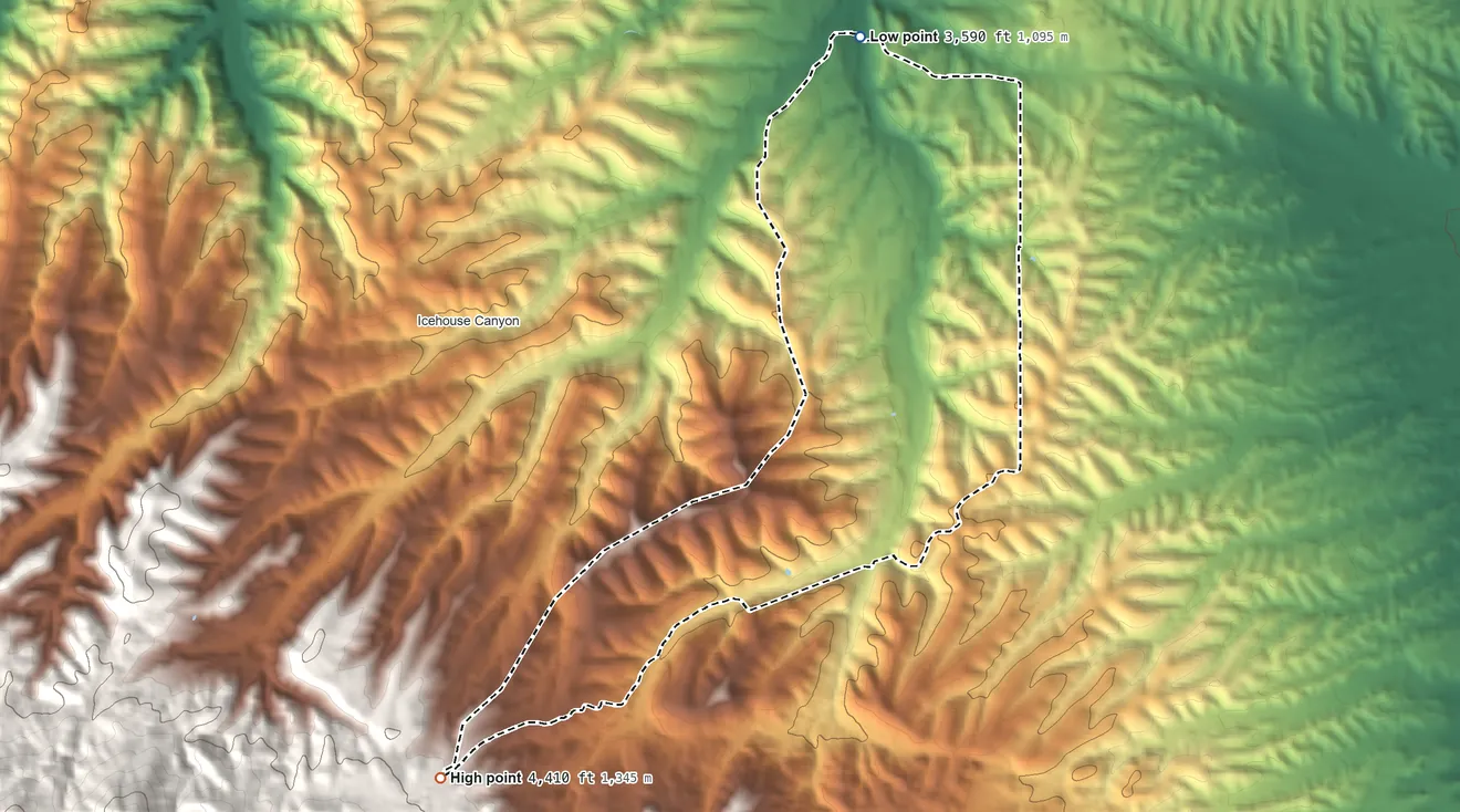 Topographic elevation map of Six Shooter Canyon, Arizona, shaded from 3,590 ft on the north side to 4,410 ft on the southwest edge, below higher ground just outside