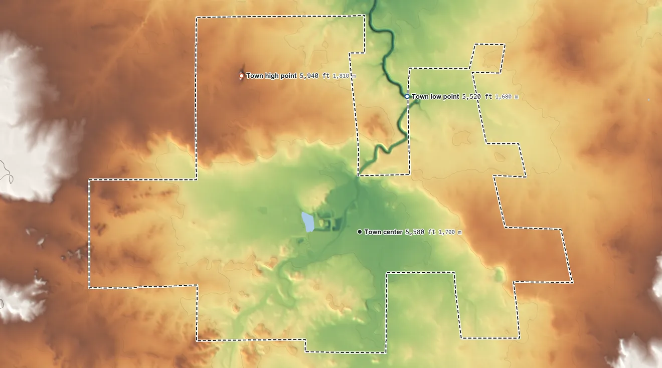 Topographic elevation map of Snowflake, Arizona, shaded from 5,520 ft on the north side to 5,945 ft on Fourmile Knoll