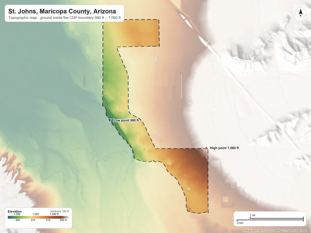 Topographic elevation map of St. Johns, Maricopa County, Arizona, shaded from 990 ft on the northwest side to 1,060 ft at the foot of the Ma Ha Tuak Range