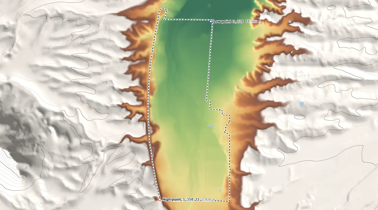 Topographic elevation map of Tumacacori-Carmen, Arizona, shaded from 3,220 ft on the north side to 3,350 ft at the foot of the Tumacacori Mountains