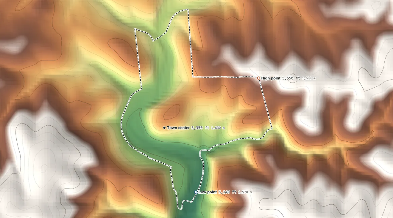 Topographic elevation map of Whispering Pines, Arizona, shaded from 5,140 ft on the southeast side to 5,550 ft at the foot of the Green Valley Hills