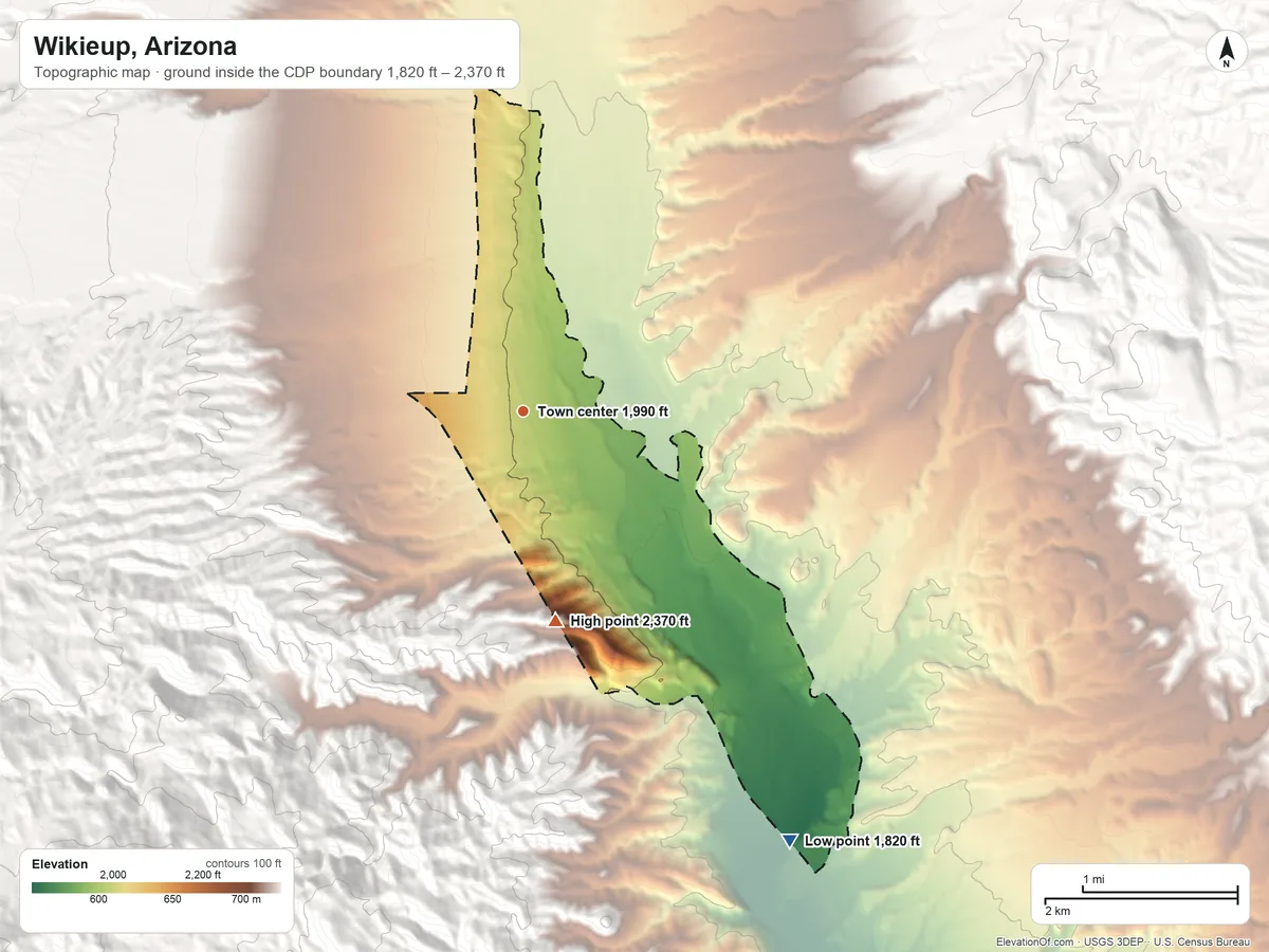Topographic elevation map of Wikieup, Arizona, shaded from 1,820 ft on the southeast side to 2,370 ft at the foot of the Aquarius Mountains