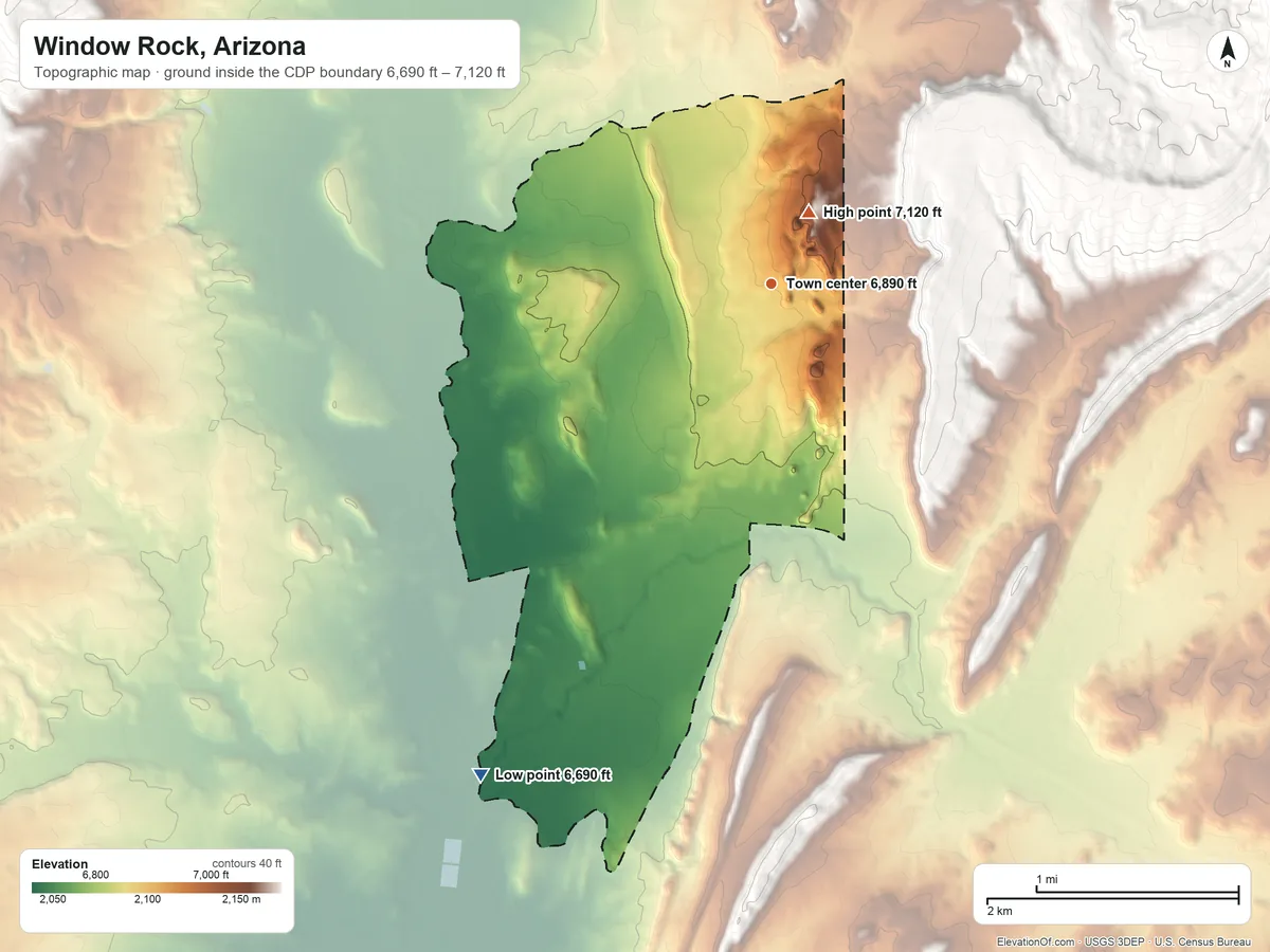 Topographic elevation map of Window Rock, Arizona, shaded from 6,690 ft on the southwest side to 7,120 ft near the middle