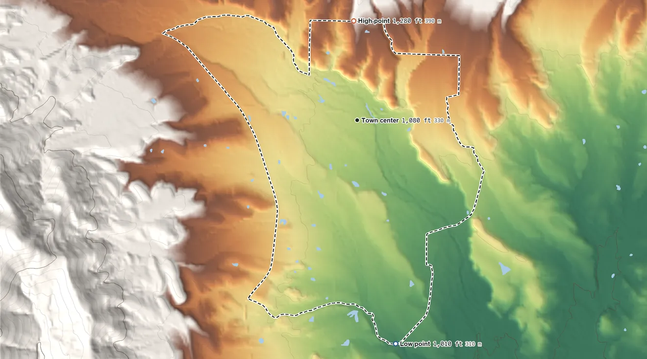 Topographic elevation map of Acorn, Arkansas, shaded from 1,010 ft on the south side to 1,280 ft at the foot of the Fourche Mountain