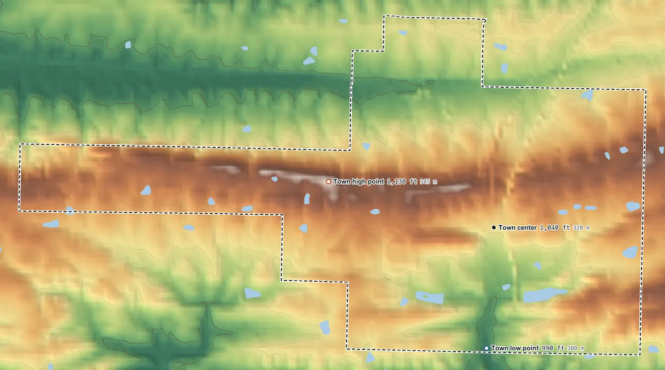 Topographic elevation map of Cove, Arkansas, shaded from 990 ft on the south side to 1,130 ft on the west side