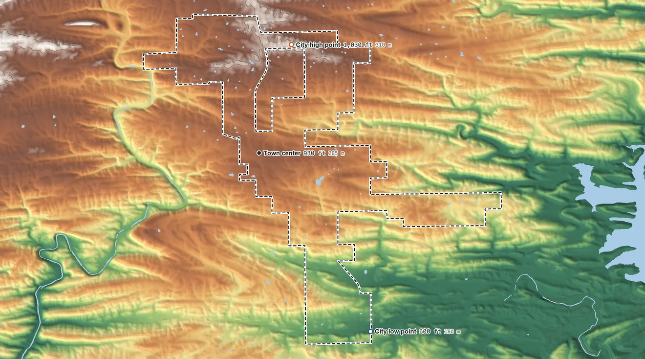 Topographic elevation map of Grannis, Arkansas, shaded from 600 ft on the southeast side to 1,030 ft on the north side