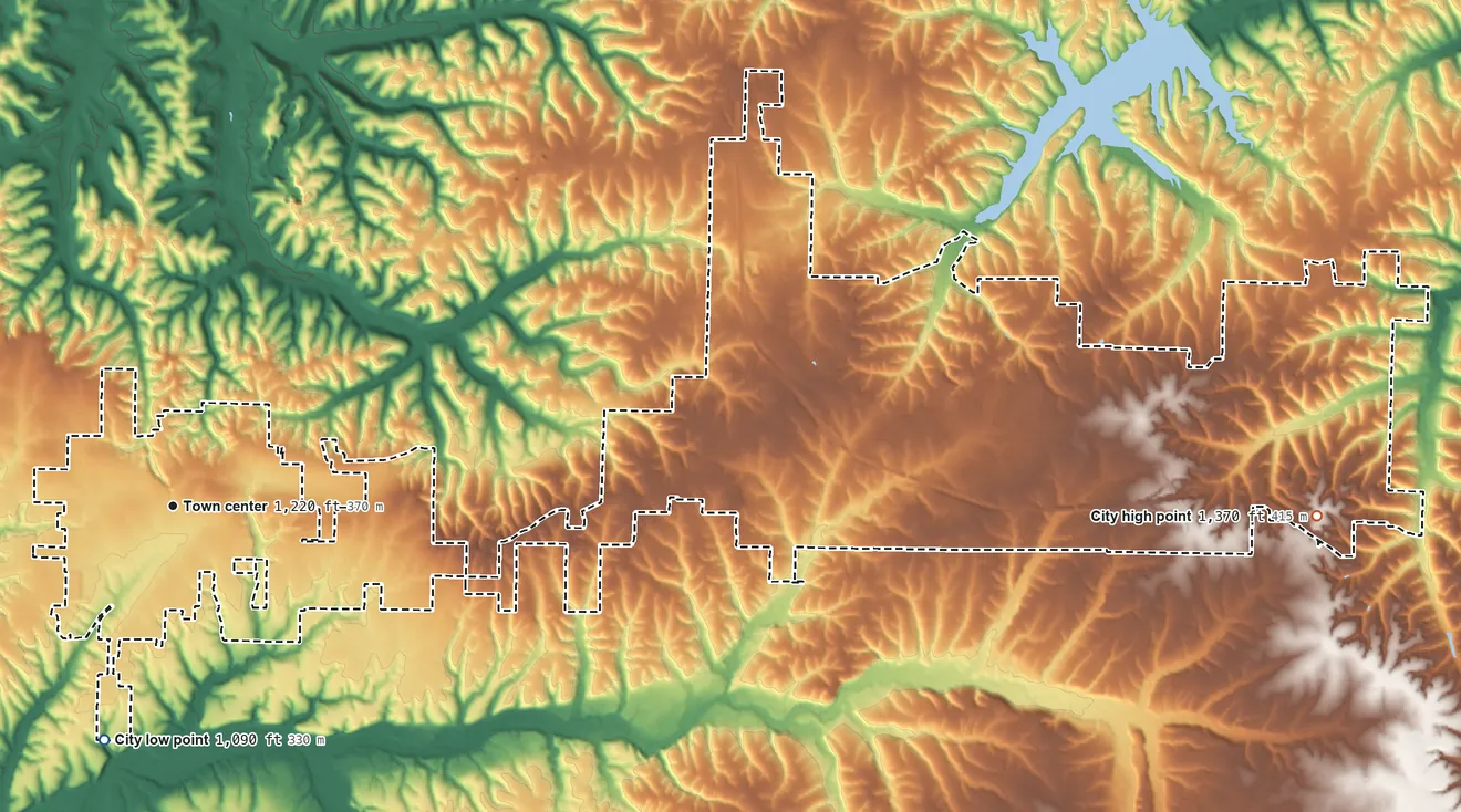 Topographic elevation map of Gravette, Arkansas, shaded from 1,090 ft on the south side to 1,370 ft on the east side