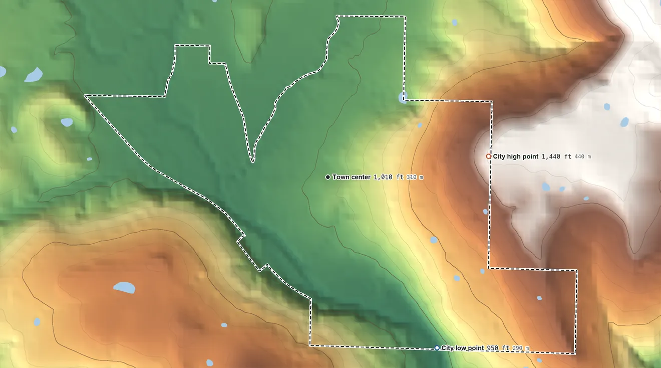 Topographic elevation map of Leslie, Arkansas, shaded from 950 ft on the southeast side to 1,440 ft on the east side