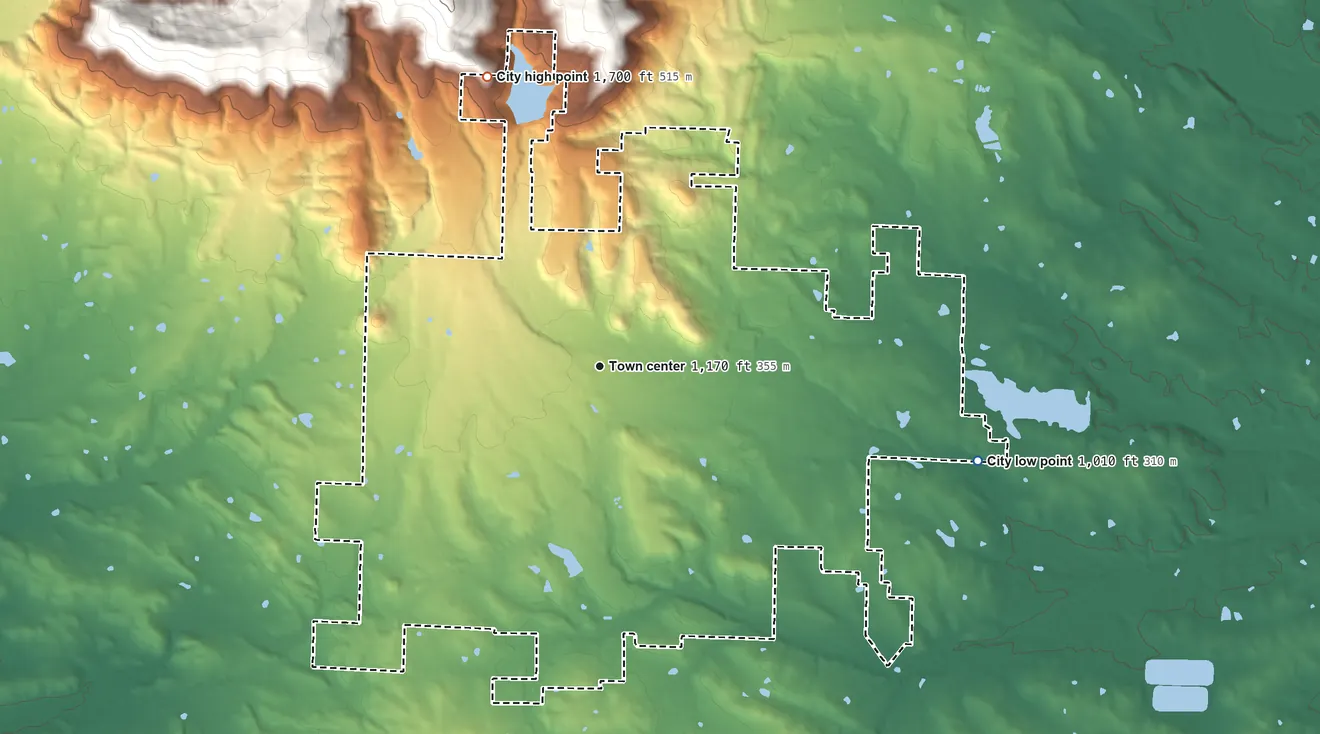 Topographic elevation map of Mena, Arkansas, shaded from 1,010 ft on the east side to 1,700 ft at the foot of the Fourche Mountain