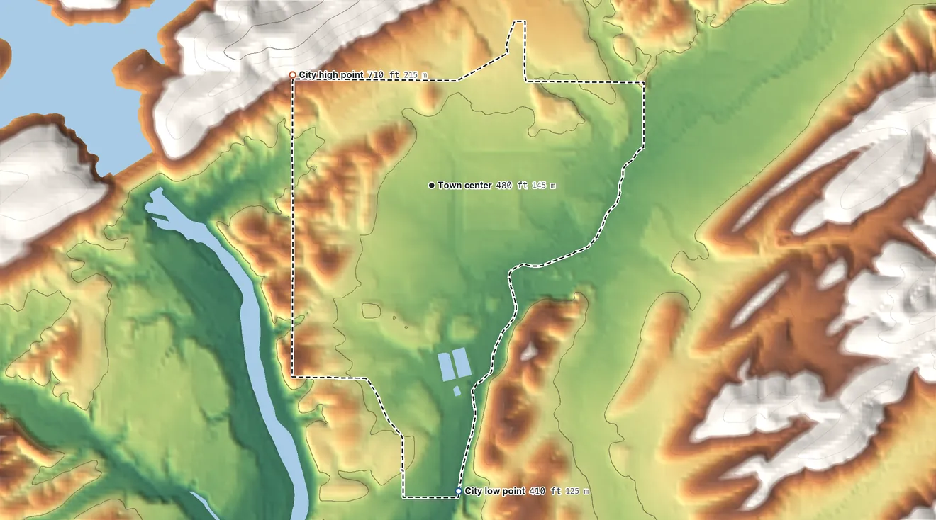 Topographic elevation map of Mountain Pine, Arkansas, shaded from 410 ft on the south side to 710 ft on the northwest edge, below higher ground just outside