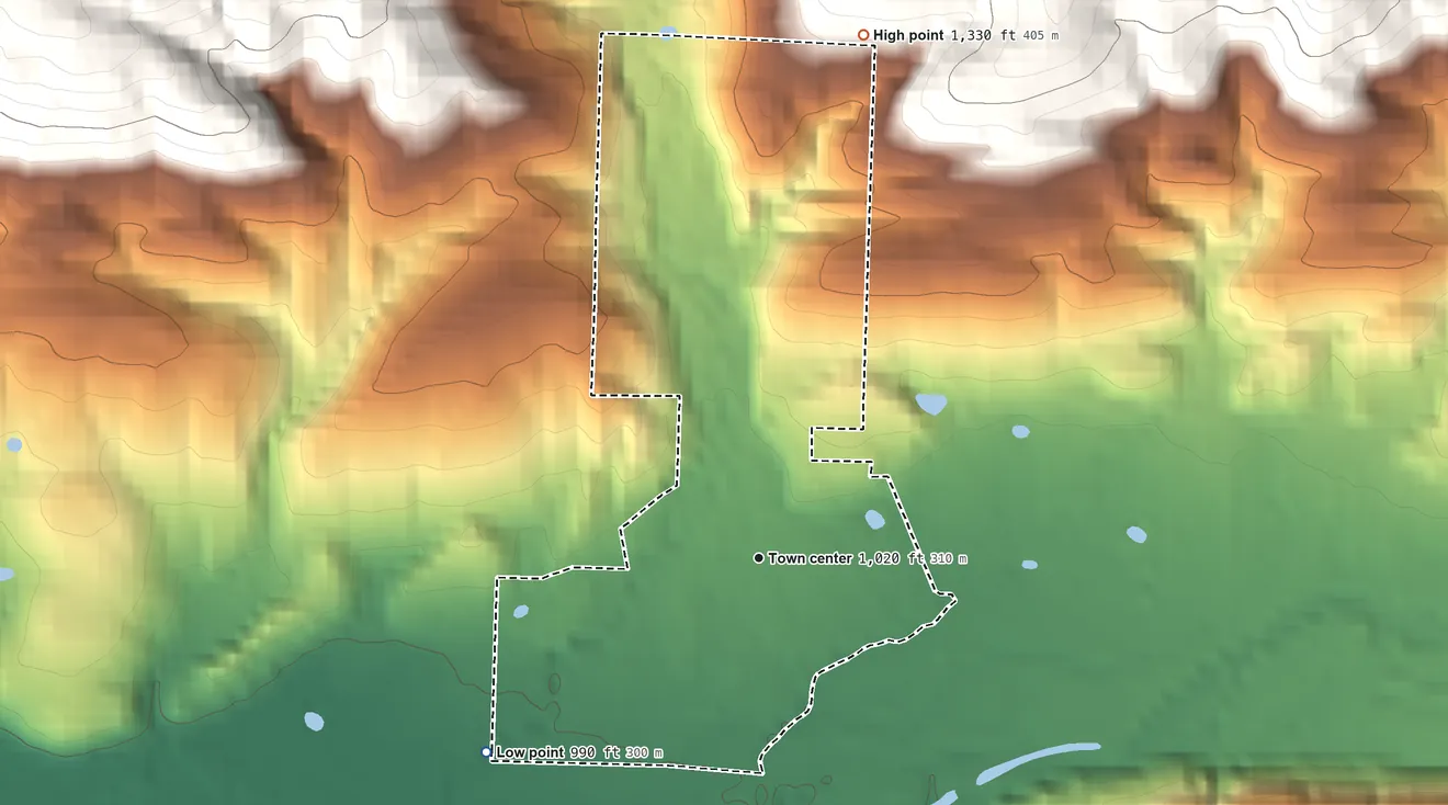 Topographic elevation map of Oark, Arkansas, shaded from 990 ft on the southwest side to 1,330 ft at the foot of the Boston Mountains