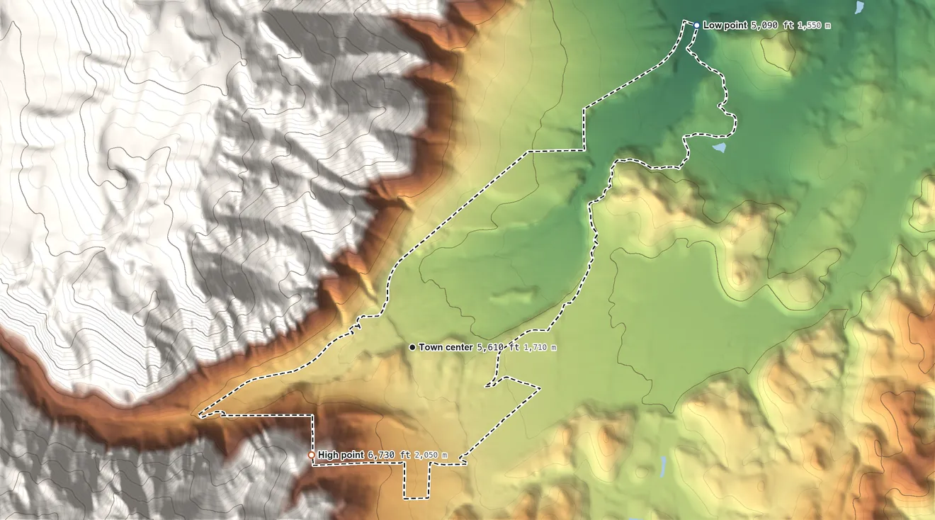 Topographic elevation map of Alpine Village, California, shaded from 5,090 ft on the northeast side to 6,730 ft on the southwest edge, below higher ground just outside