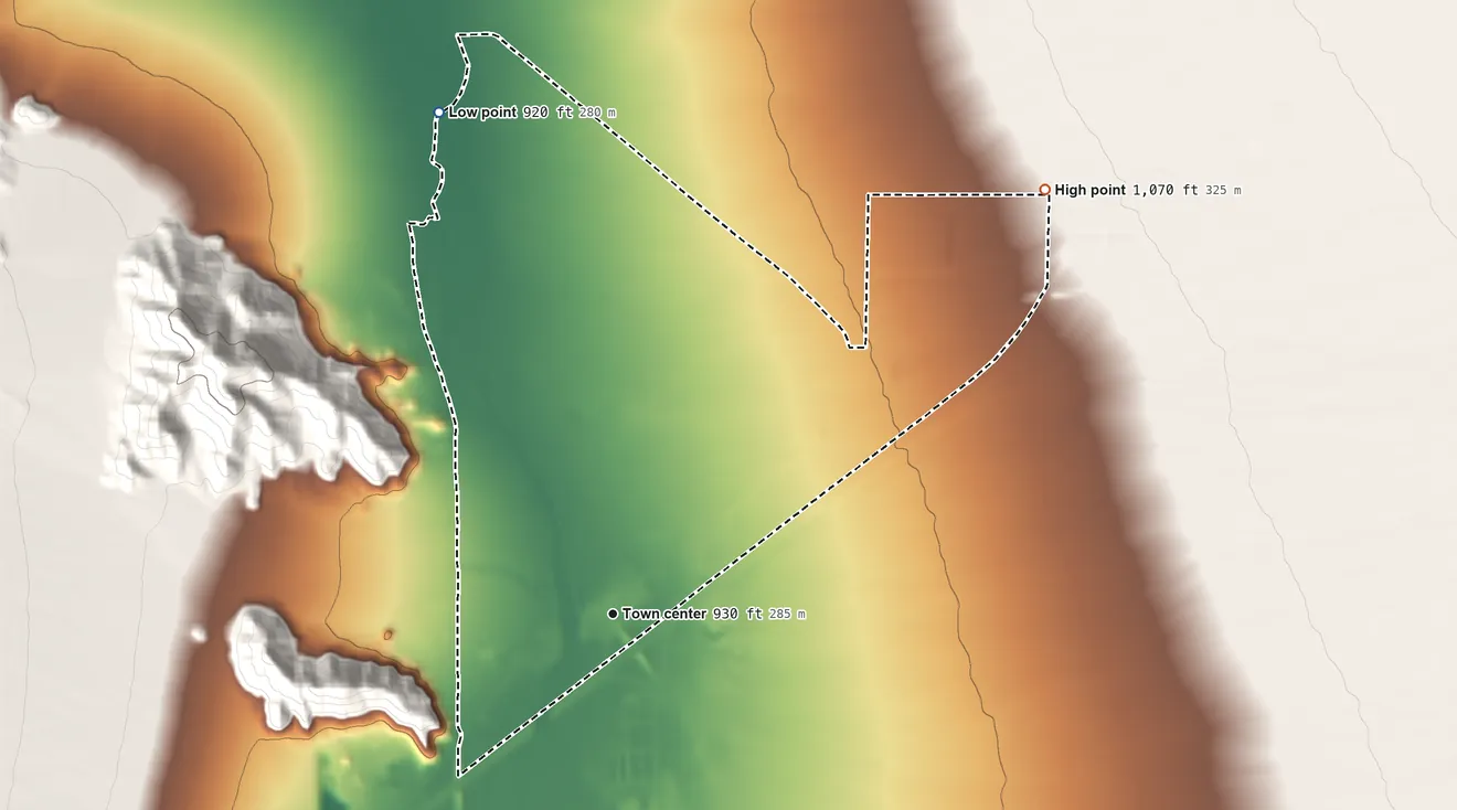 Topographic elevation map of Baker, California, shaded from 920 ft on the north side to 1,070 ft on the northeast side