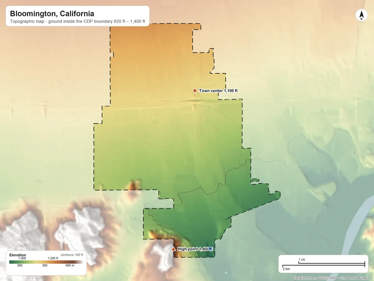Topographic elevation map of Bloomington, California, shaded from 920 ft on the south side to 1,400 ft at the foot of the Jurupa Mountains