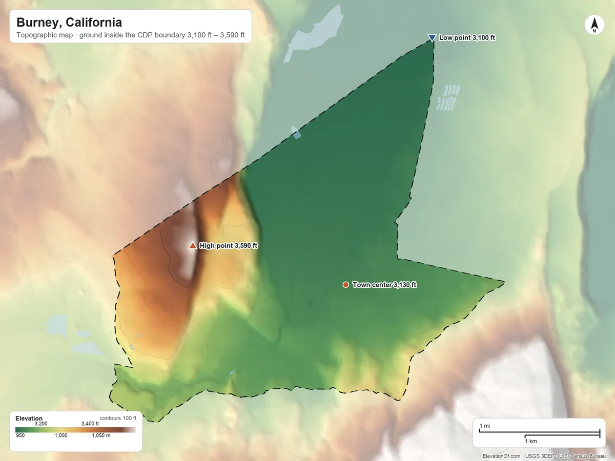 Topographic elevation map of Burney, California, shaded from 3,100 ft on the north side to 3,590 ft on the west side