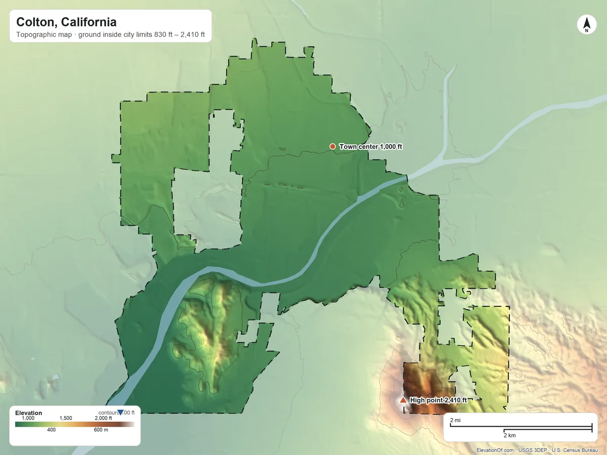 Topographic elevation map of Colton, California, shaded from 830 ft on the southwest side to 2,410 ft on the south edge, below higher ground just outside
