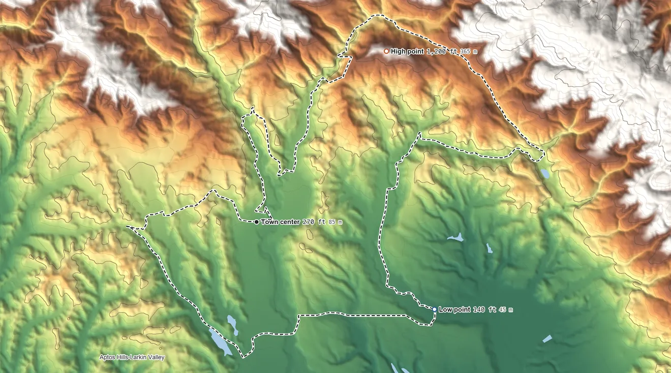 Topographic elevation map of Corralitos, California, shaded from 140 ft on the southeast side to 1,200 ft at the foot of the Sierra Azul