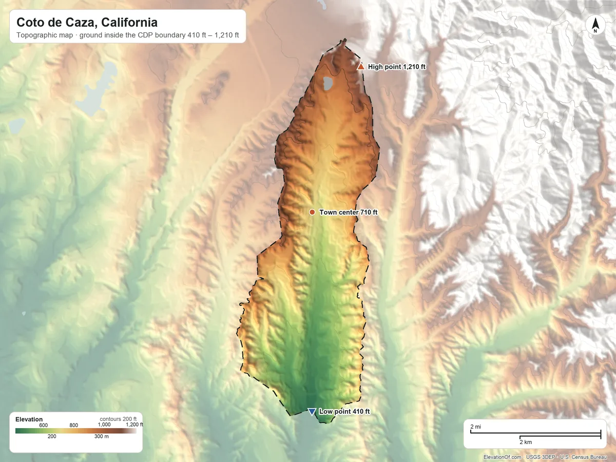 Topographic elevation map of Coto de Caza, California, shaded from 410 ft on the south side to 1,210 ft at the foot of the Santa Ana Mountains