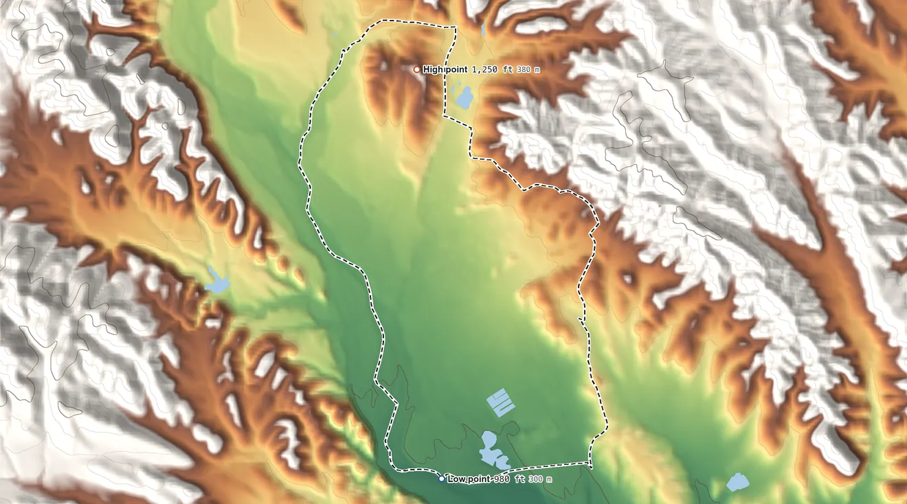 Topographic elevation map of Fort Hunter Liggett, California, shaded from 980 ft on the south side to 1,250 ft at the foot of the Santa Lucia Range