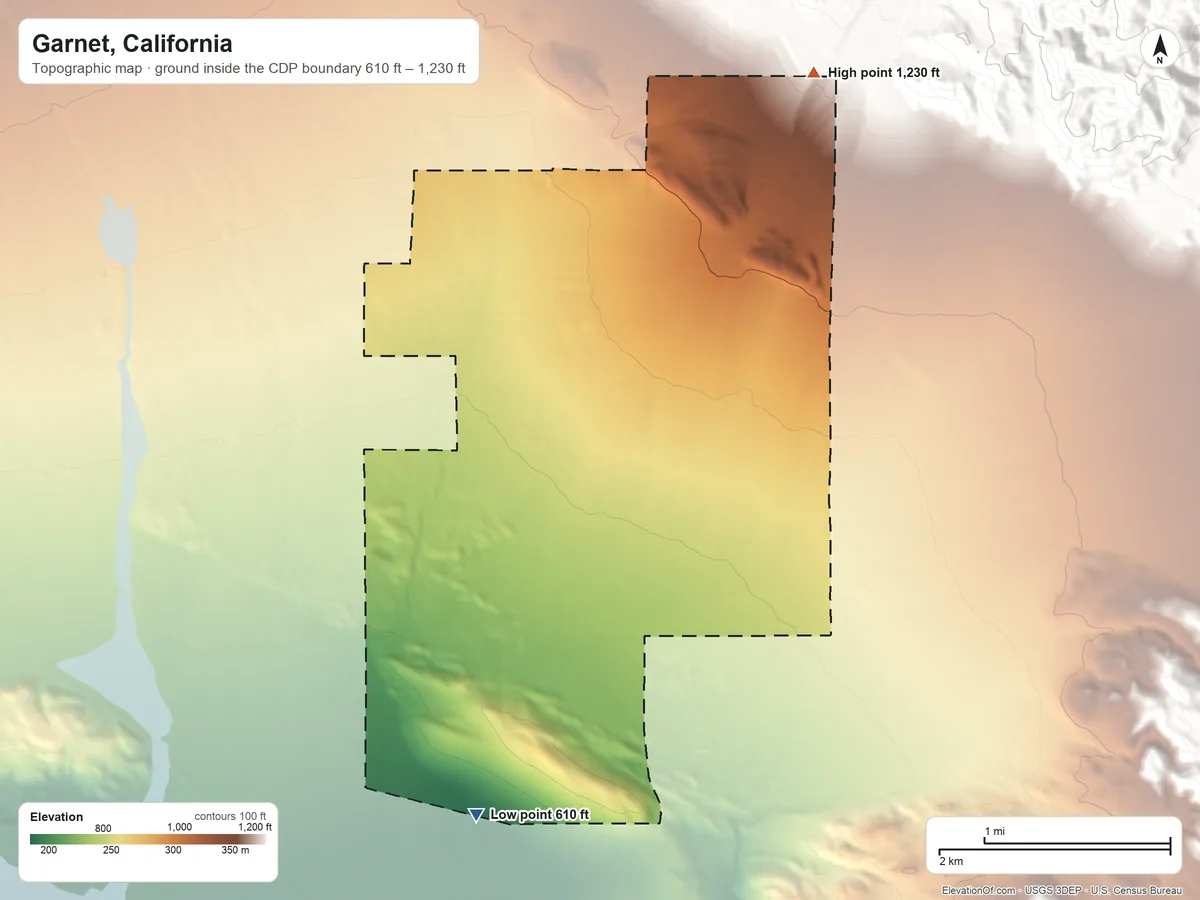 Topographic elevation map of Garnet, California, shaded from 610 ft on the south side to 1,230 ft at the foot of the Little San Bernardino Mountains