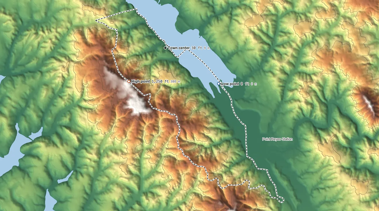 Topographic elevation map of Inverness, California, shaded from sea level level on Tomales Bay to 1,250 ft on the southwest edge, below higher ground just outside