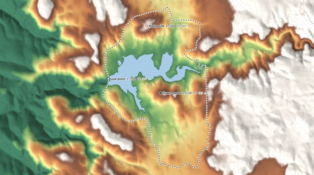 Topographic elevation map of Lake Wildwood, California, shaded from 1,180 ft on the west side to 1,580 ft at the foot of the Oat Hills