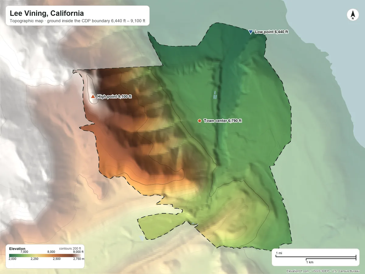 Topographic elevation map of Lee Vining, California, shaded from 6,440 ft on the northeast side to 9,100 ft on the west edge, below higher ground just outside