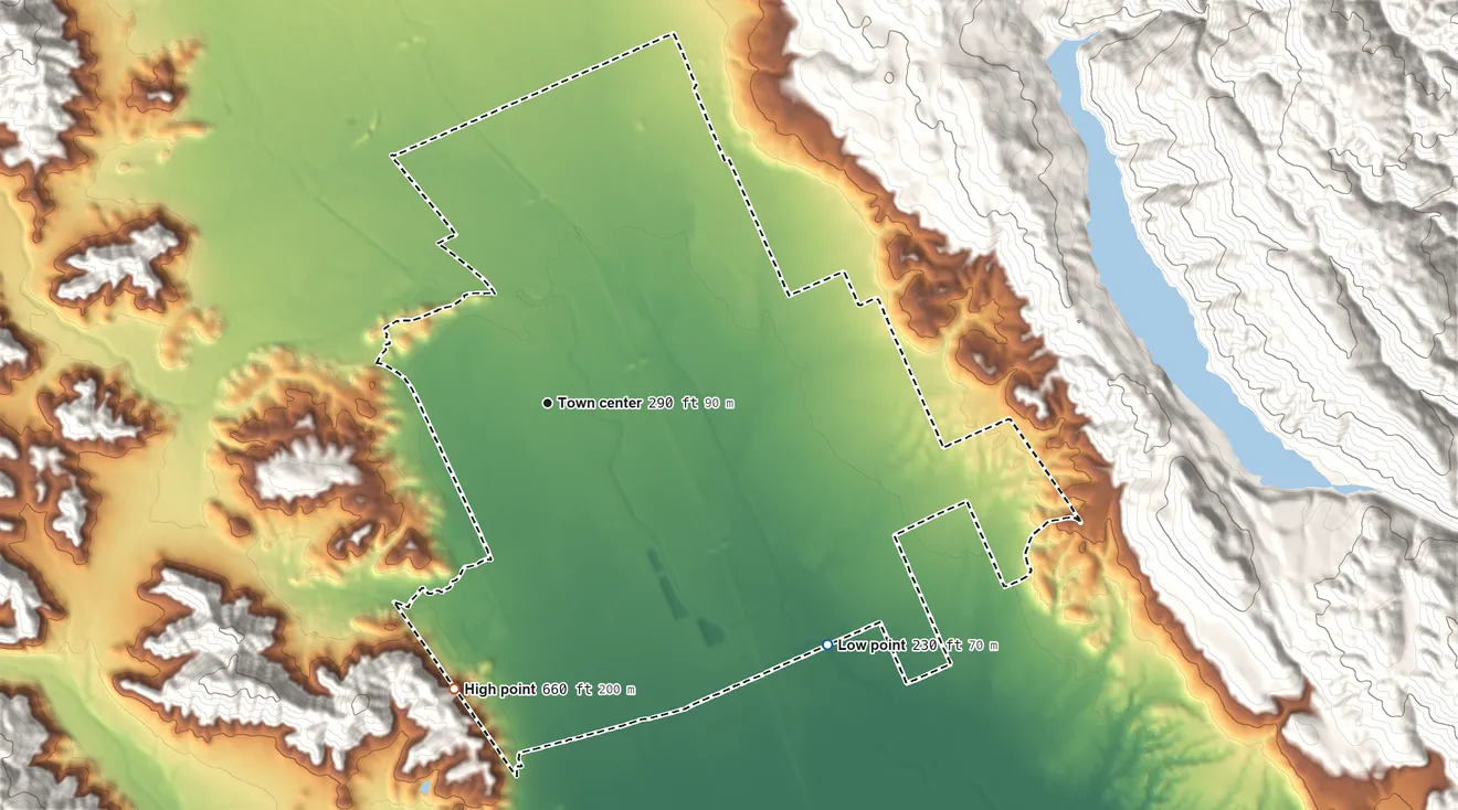 Topographic elevation map of San Martin, California, shaded from 230 ft on the southeast side to 660 ft at the foot of the Santa Teresa Hills