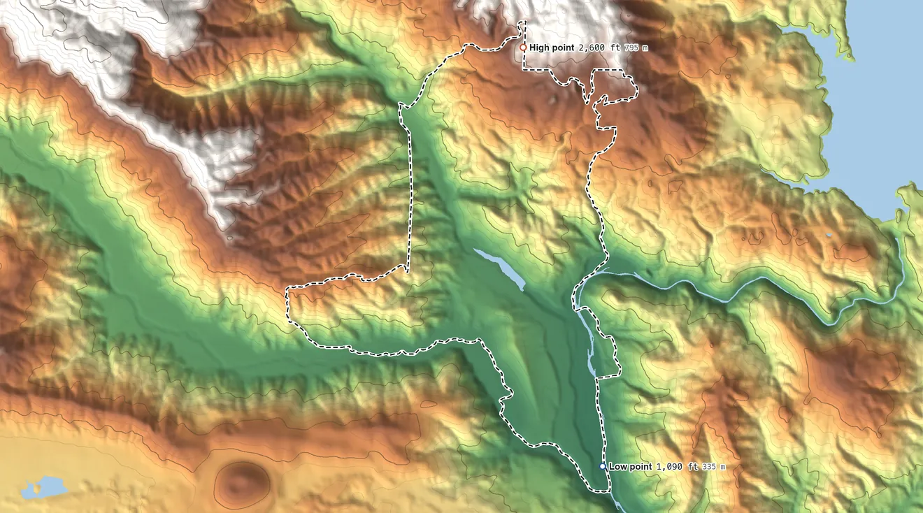 Topographic elevation map of Spring Valley, Lake County, California, shaded from 1,090 ft on the southeast side to 2,600 ft on the north edge, below higher ground just outside