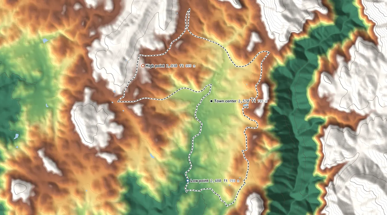 Topographic elevation map of Tuolumne City, California, shaded from 2,480 ft on the south side to 2,930 ft at the foot of the Red Hills