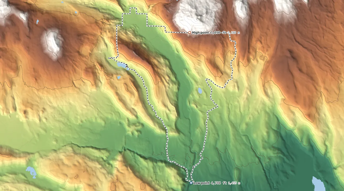 Topographic elevation map of Warner Valley, California, shaded from 4,780 ft on the south side to 7,090 ft on the north edge, below higher ground just outside