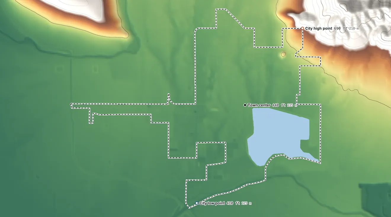 Topographic elevation map of Woodlake, California, shaded from 410 ft on the southwest side to 690 ft at the foot of the Venice Hills