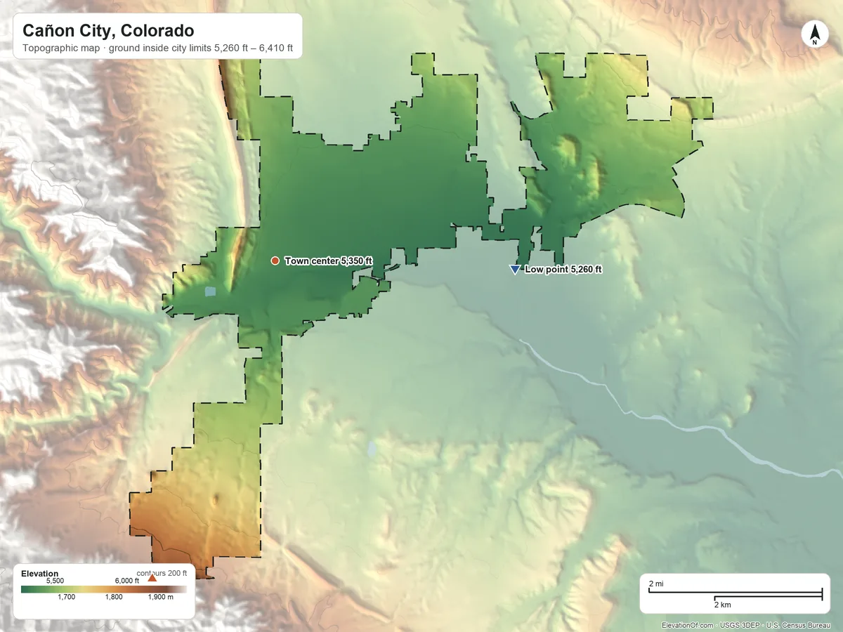 Topographic elevation map of Cañon City, Colorado, shaded from 5,260 ft on the east side to 6,410 ft on the south edge, below higher ground just outside