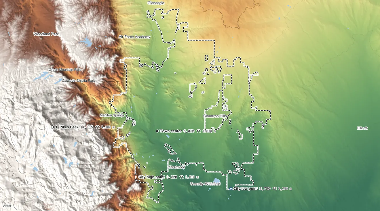 Topographic elevation map of Colorado Springs, Colorado, shaded from 5,720 ft on the southeast side to 9,219 ft on The Horns