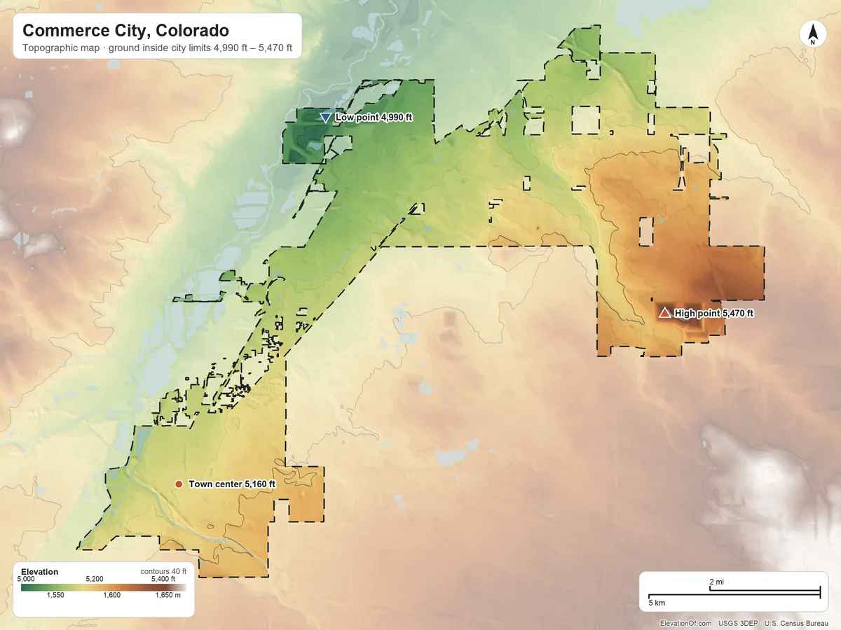 Topographic elevation map of Commerce City, Colorado, shaded from 4,990 ft on the north side to 5,470 ft on the east side