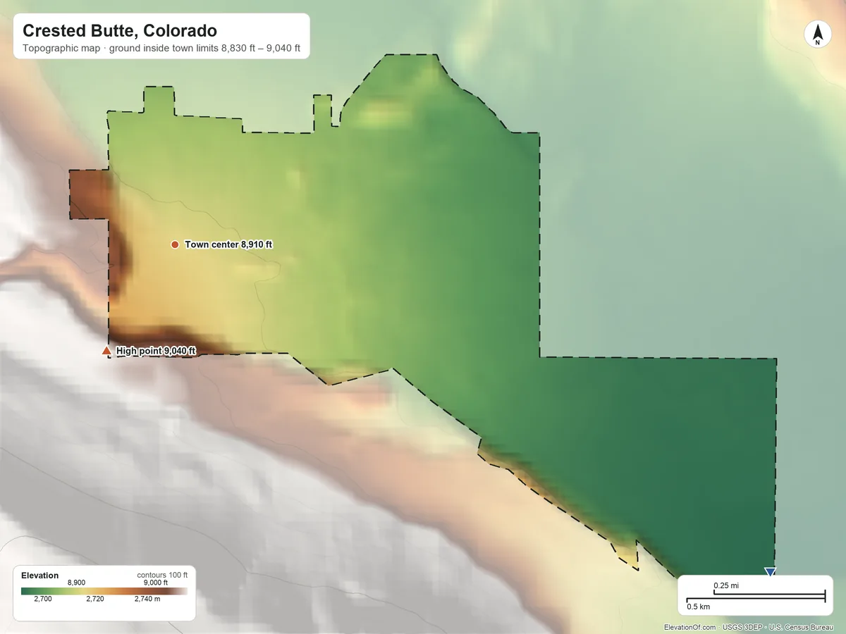 Topographic elevation map of Crested Butte, Colorado, shaded from 8,830 ft on the southeast side to 9,040 ft at the foot of the Ruby Range