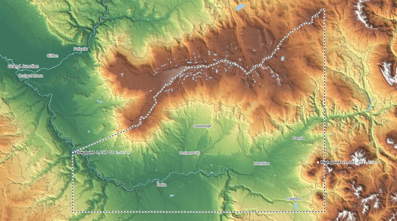 Topographic elevation map of Delta County, Colorado, shaded from 4,740 ft on the west side to 11,402 ft on Mount Lamborn