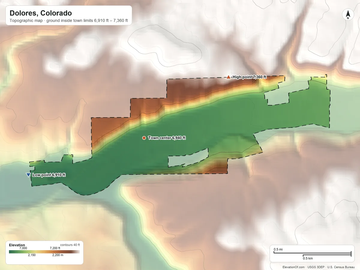 Topographic elevation map of Dolores, Colorado, shaded from 6,910 ft on the west side to 7,360 ft on the northeast side