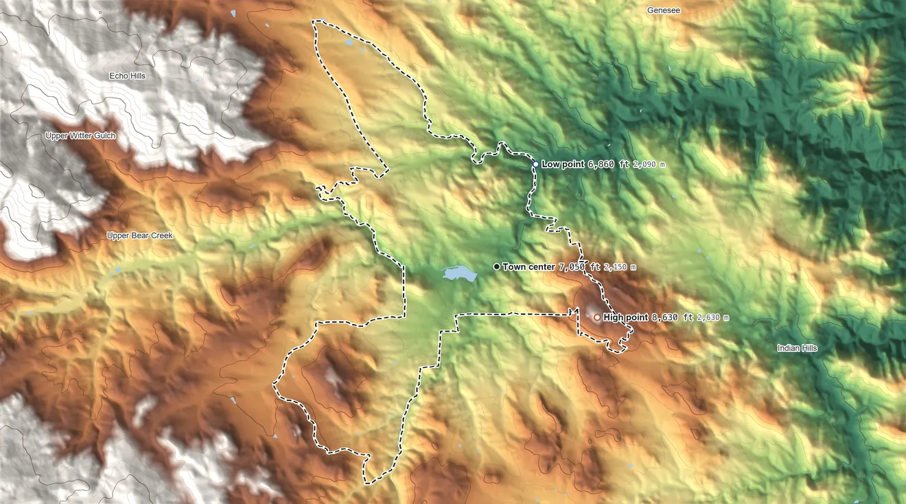 Topographic elevation map of Evergreen, Colorado, shaded from 6,860 ft on the north side to 8,633 ft on Bear Mountain