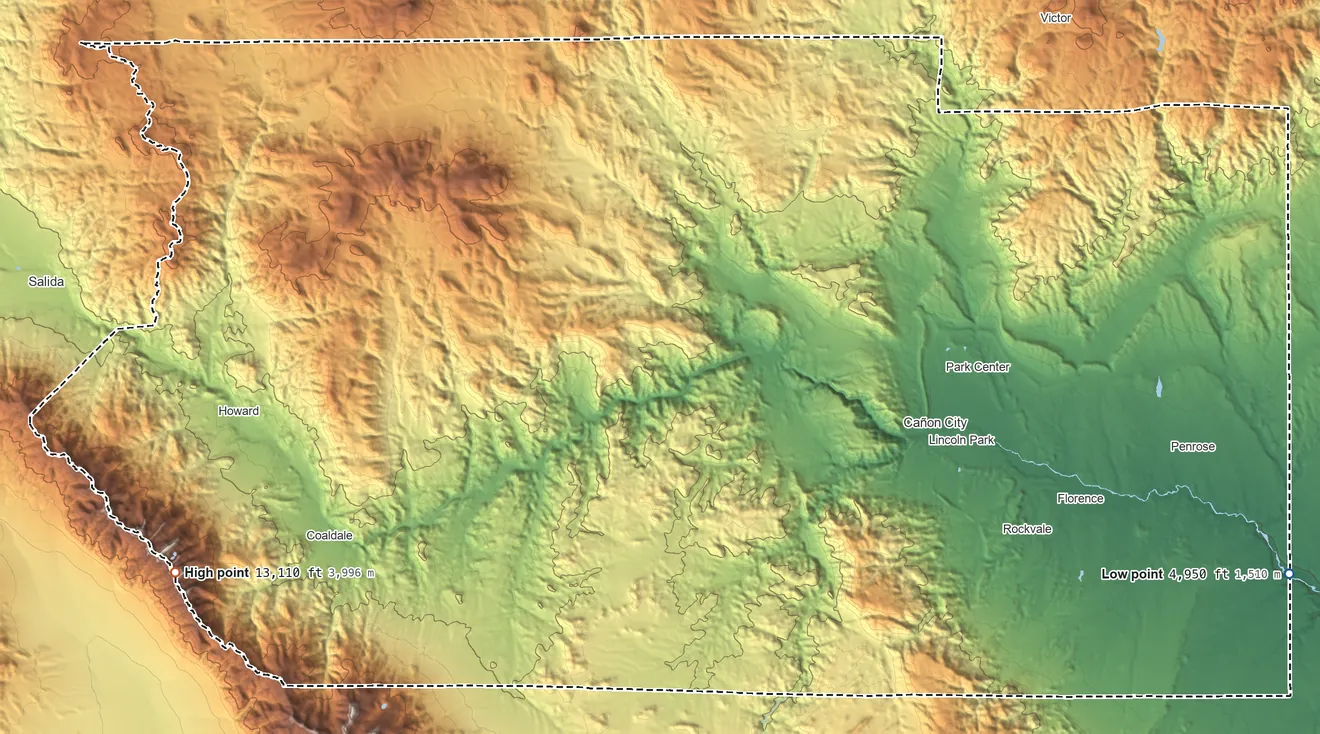 Topographic elevation map of Fremont County, Colorado, shaded from 4,950 ft on the east side to 13,110 ft on Bushnell Peak