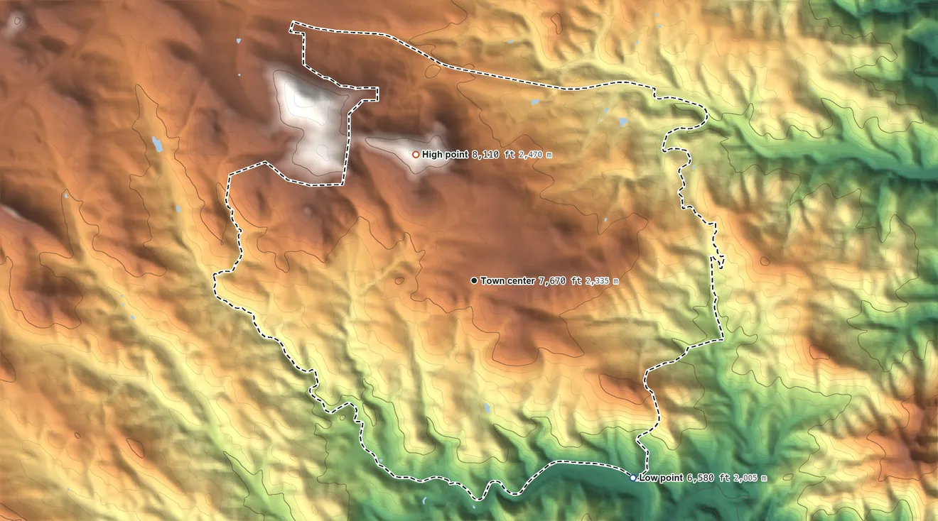 Topographic elevation map of Genesee, Colorado, shaded from 6,580 ft on the southeast side to 8,110 ft on the northwest side