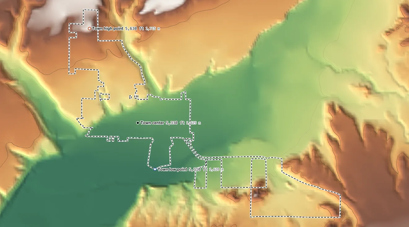 Topographic elevation map of Hotchkiss, Colorado, shaded from 5,310 ft on the south side to 5,630 ft on the northwest edge, below higher ground just outside