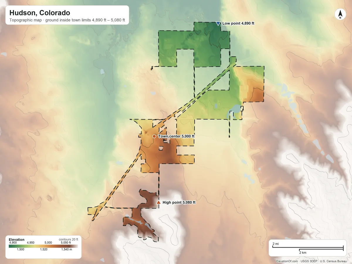 Topographic elevation map of Hudson, Colorado, shaded from 4,890 ft on the northeast side to 5,080 ft on the south side