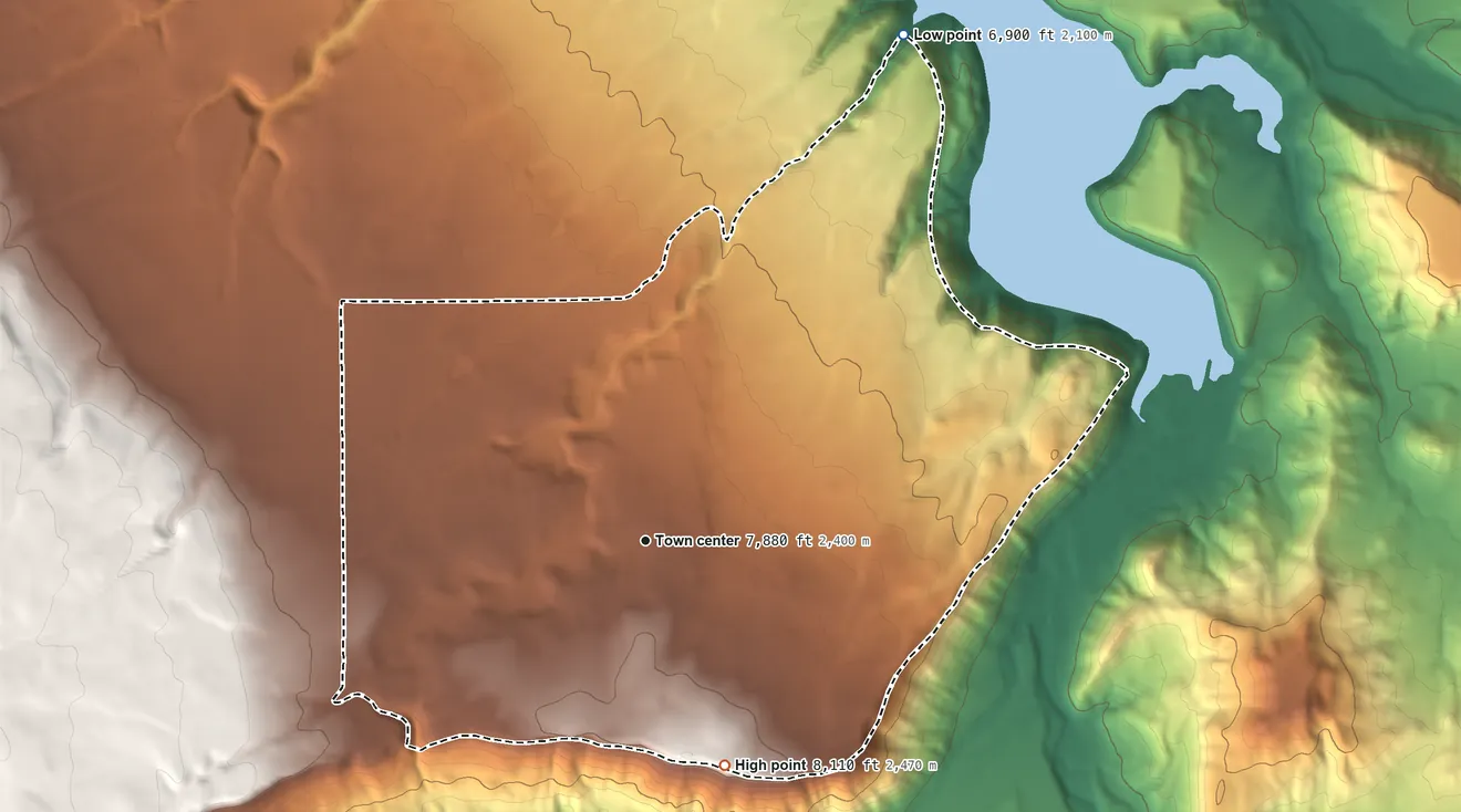 Topographic elevation map of Loghill Village, Colorado, shaded from 6,900 ft on the northeast side to 8,110 ft on the south side